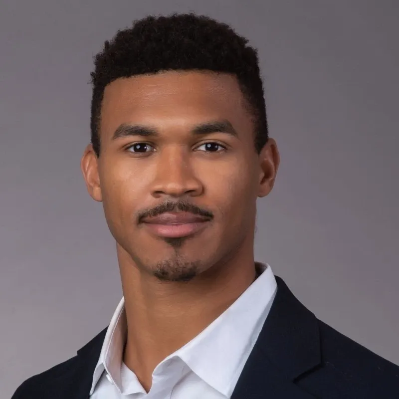a headshot image of Wayne P from Trellix